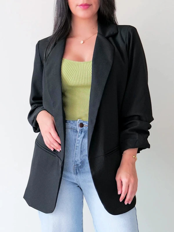 Image of our ruched sleeve black blazer for women. 