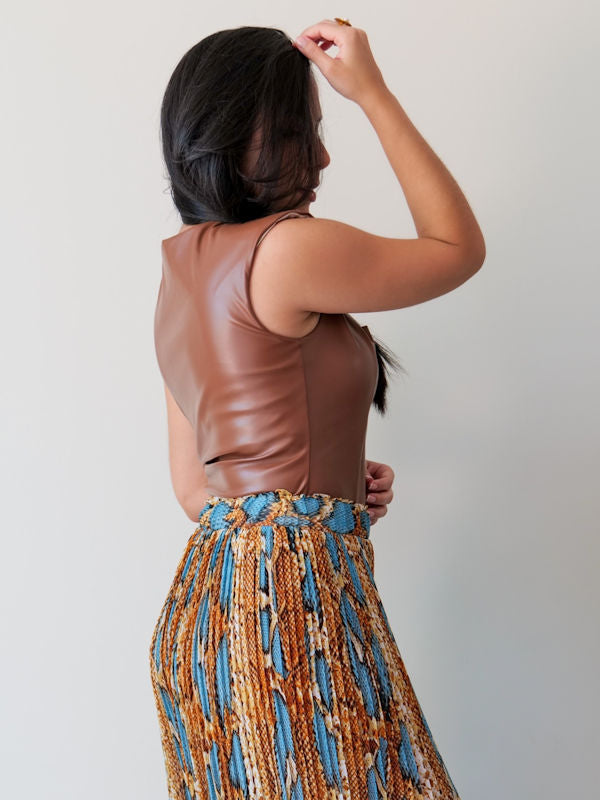 Side view of our leatherette bodysuit in brown color. 