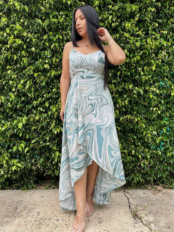 A marble print dress with high-low hem perfect a summer resort vacation. 