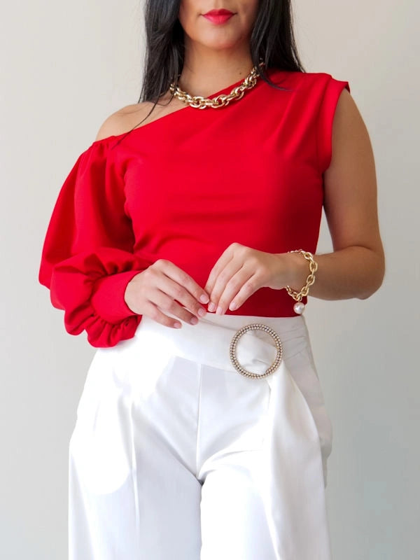 Woman showing our off the shoulder red long sleeve top. 