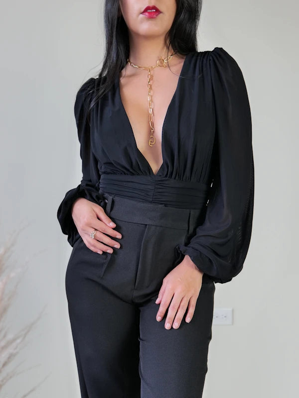 Image of our deep v neck bodysuit in black for women. 