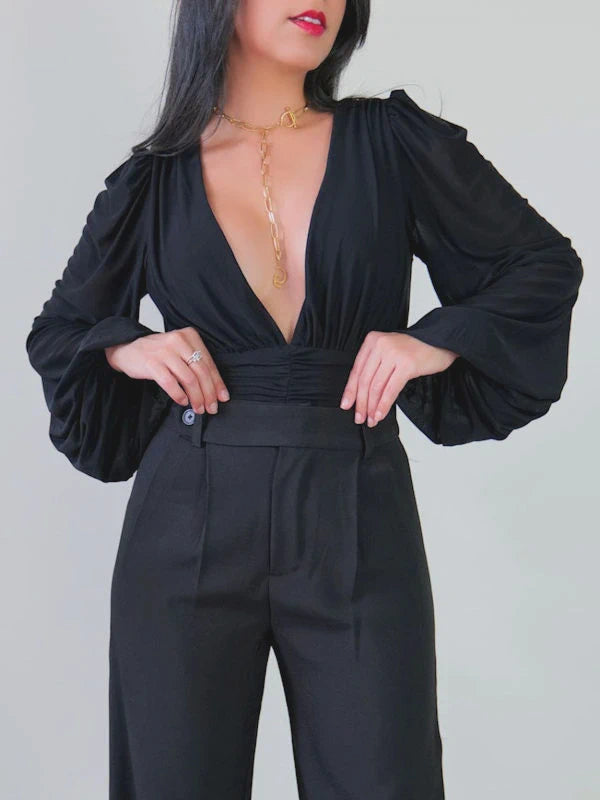 Ladies long sleeve bodysuit made of thick mesh. 