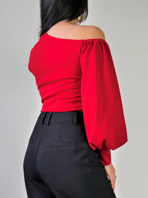Back view of our one sleeve off shoulder top for women.