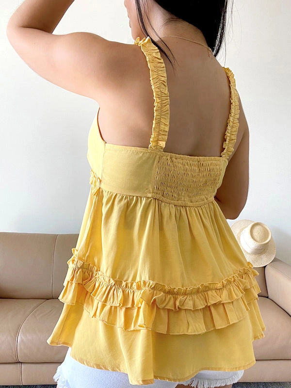 Back view of a summer ruffle top.