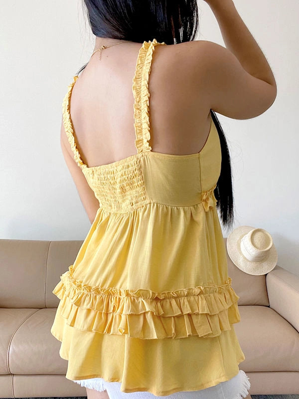 Back view of a cute yellow summer top